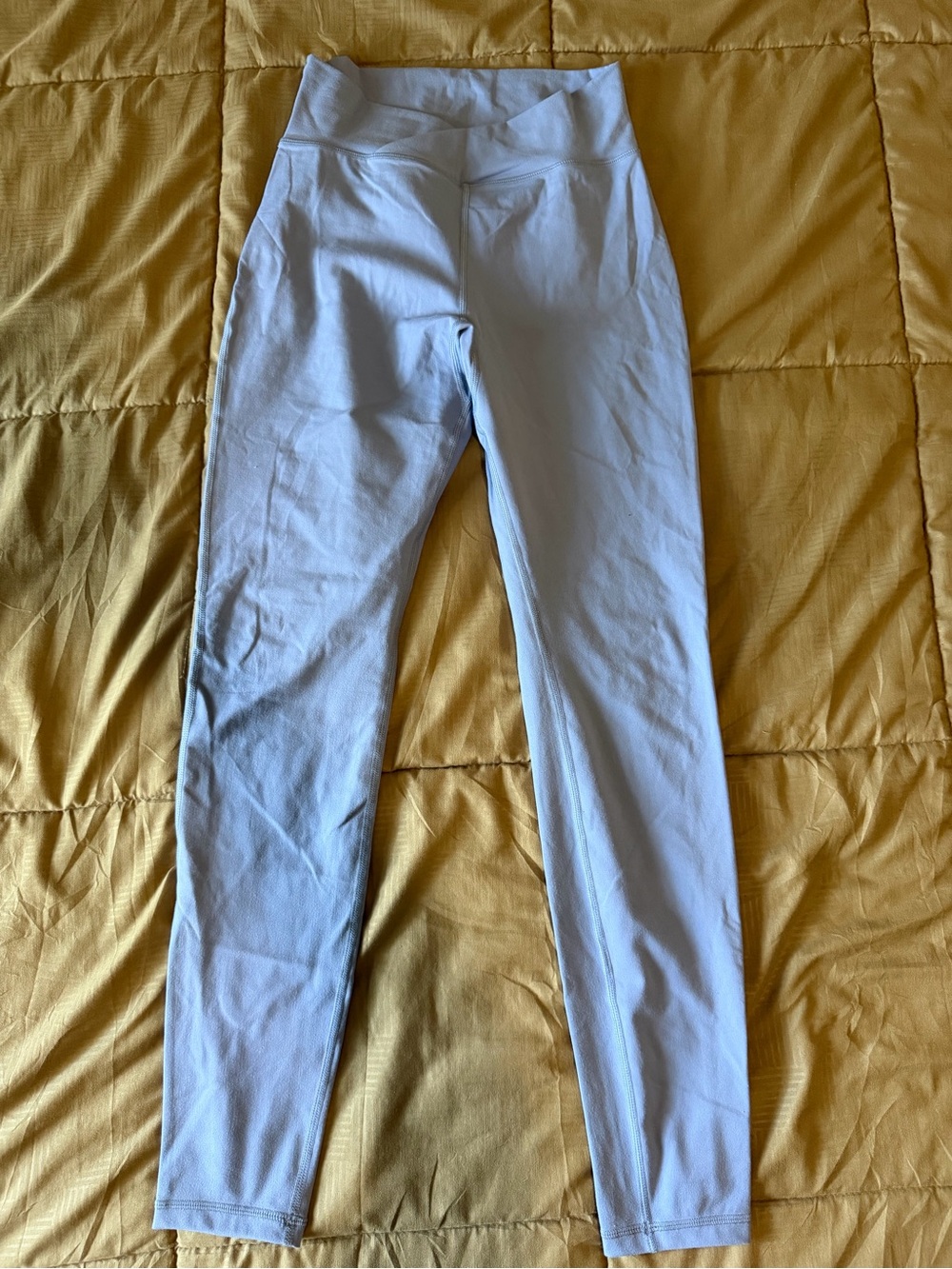 ALPHALETE: criss cross front Blue High-Waist Leggings